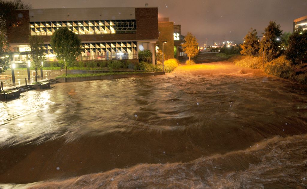 Floodwater rushes down West Ck last night. Floodwater rushes down West Ck last night.