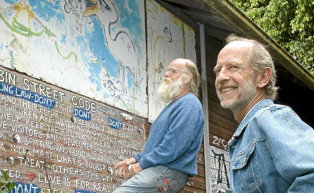 Michael Balderstone (on the ladder) and David Hallett inspect part of a painting by Rolf Harris that was found at the rubbish tip that now hangs outside on a wall at the Nimbin Museum. Michael Balderstone (on the ladder) and David Hallett inspect part of a painting by Rolf Harris that was found at the rubbish tip that now hangs outside on a wall at the Nimbin Museum.