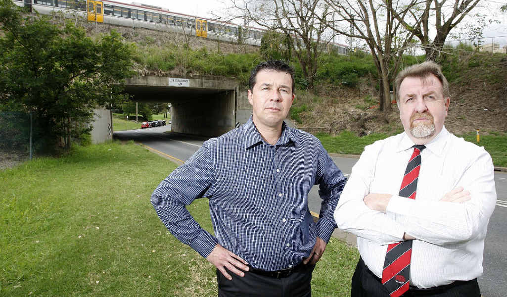 Councillor Andrew Antoniolli and Planning and Development chairman Paul Tully at the Marsden Pde, Ipswich site that council are planning to build a levee to protect against future flooding. Councillor Andrew Antoniolli and Planning and Development chairman Paul Tully at the Marsden Pde, Ipswich site that council are planning to build a levee to protect against future flooding.