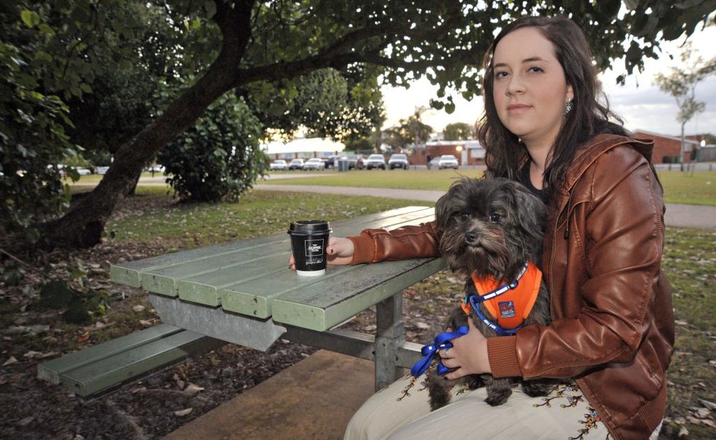 Deanna Bradford enjoys a take-away coffee in the park at Cotton Tree with her dog, Atticus. Deanna Bradford enjoys a take-away coffee in the park at Cotton Tree with her dog, Atticus.