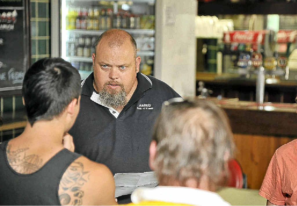 Assistant secretary of the Australian Meat Industry Employees Union (Newcastle North) Justin Smith in talks with abattoir workers at the Good Intent Hotel. 