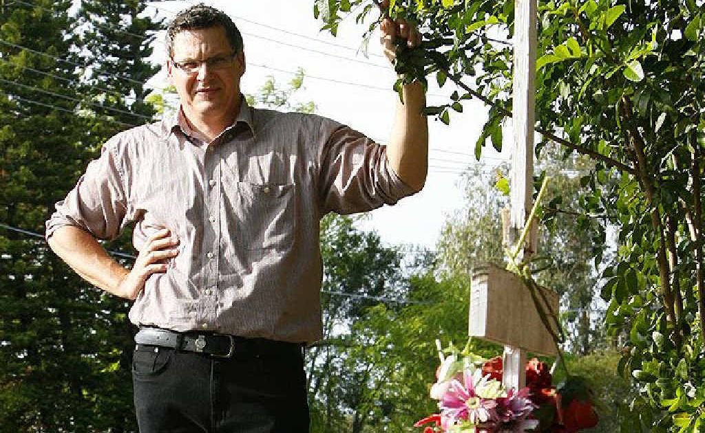 Poet Brett Dionysius visits the road side memorial to Andrew Bornen on Albion Street in Brassall. Brett has written award-winning poems about tragic deaths in the Ipswich area. Poet Brett Dionysius visits the road side memorial to Andrew Bornen on Albion Street in Brassall. Brett has written award-winning poems about tragic deaths in the Ipswich area.