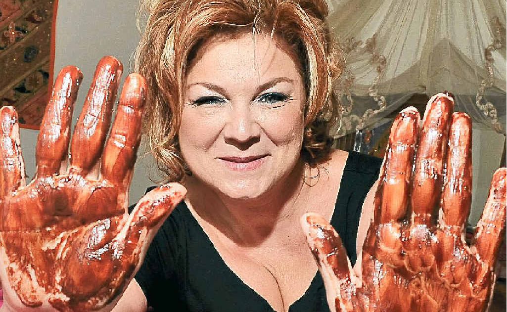 Masseuse Laurence De Conto, of Doonan, says chocolate is as good on the outside as the inside. Masseuse Laurence De Conto, of Doonan, says chocolate is as good on the outside as the inside.