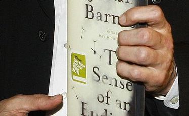 Julian Barnes with his novel The Sense of an Ending. Julian Barnes with his novel The Sense of an Ending.