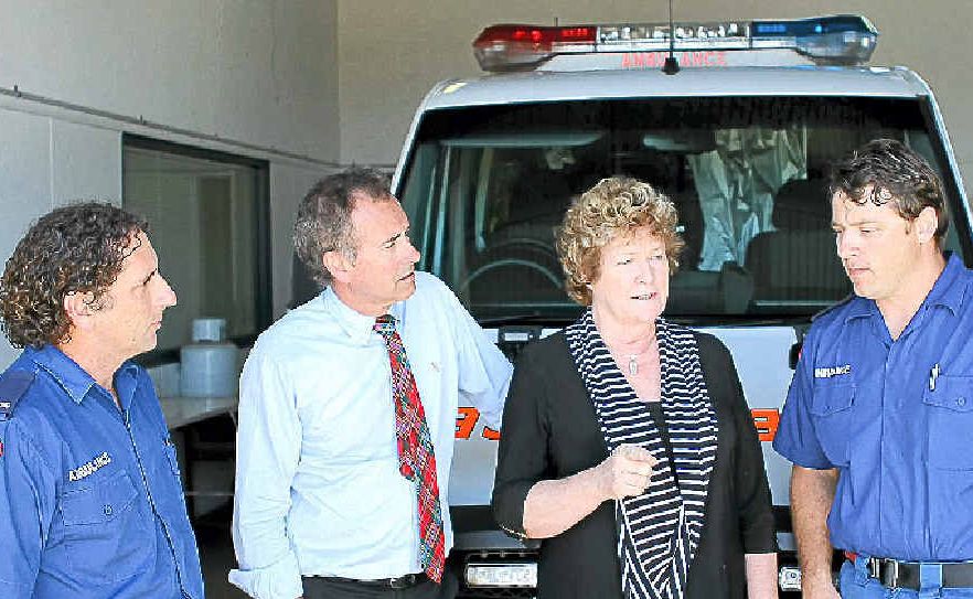 Paramedics David Jeffrey and Gavin Bridges talk to NSW Health Minister Jillian Skinner and Nationals Candidate for the Clarence by-election Chris Gulaptis at the Yamba Ambulance Station about issues facing the NSW Ambulance service. 