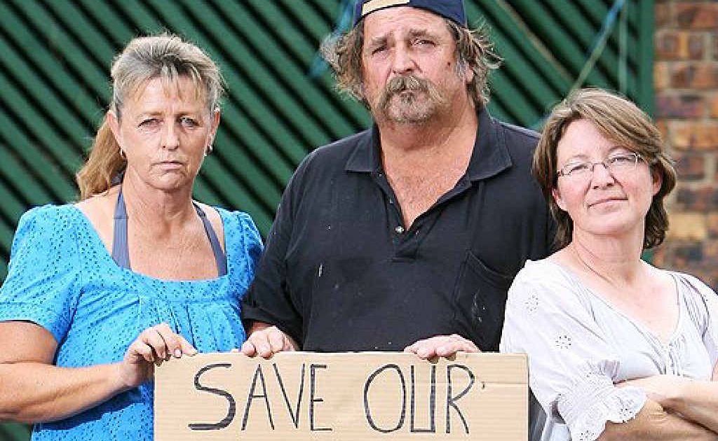 Bundamba Flood Group organiser Dianne Dimitrov, with husband Van Dimitrov and group secretary Erin Cook, are demanding dam levels be reduced. Bundamba Flood Group organiser Dianne Dimitrov, with husband Van Dimitrov and group secretary Erin Cook, are demanding dam levels be reduced.