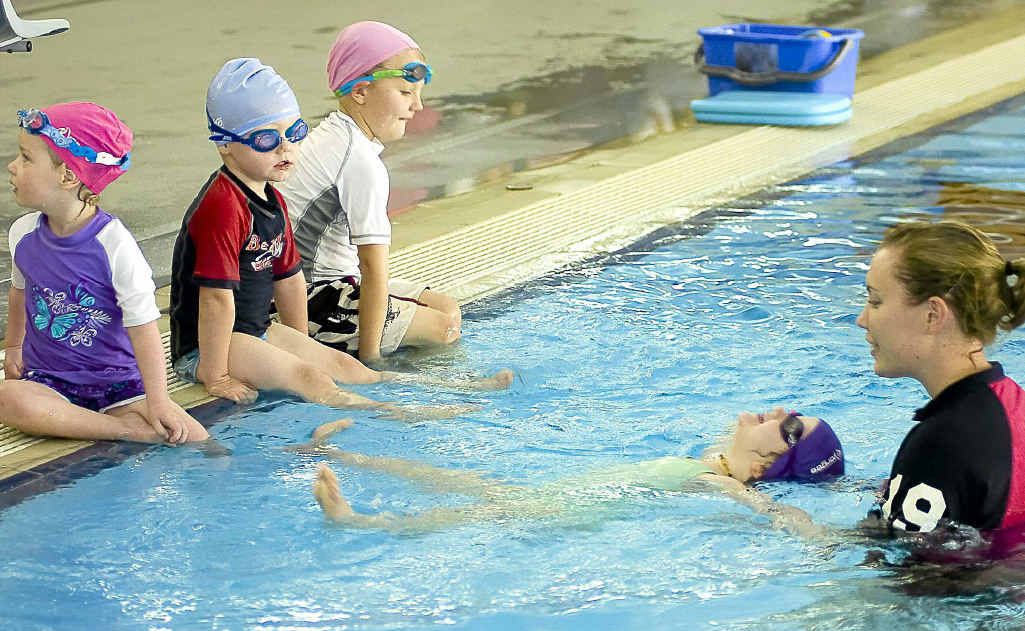 Having a swimming lesson at Trinity College swimming pool, from left to right, Alana Foster, two, Lachlan MacRae, three, Joshua McInerney, five, Freya Byrne, three, and swim instructor Nicole Larkings. Having a swimming lesson at Trinity College swimming pool, from left to right, Alana Foster, two, Lachlan MacRae, three, Joshua McInerney, five, Freya Byrne, three, and swim instructor Nicole Larkings.