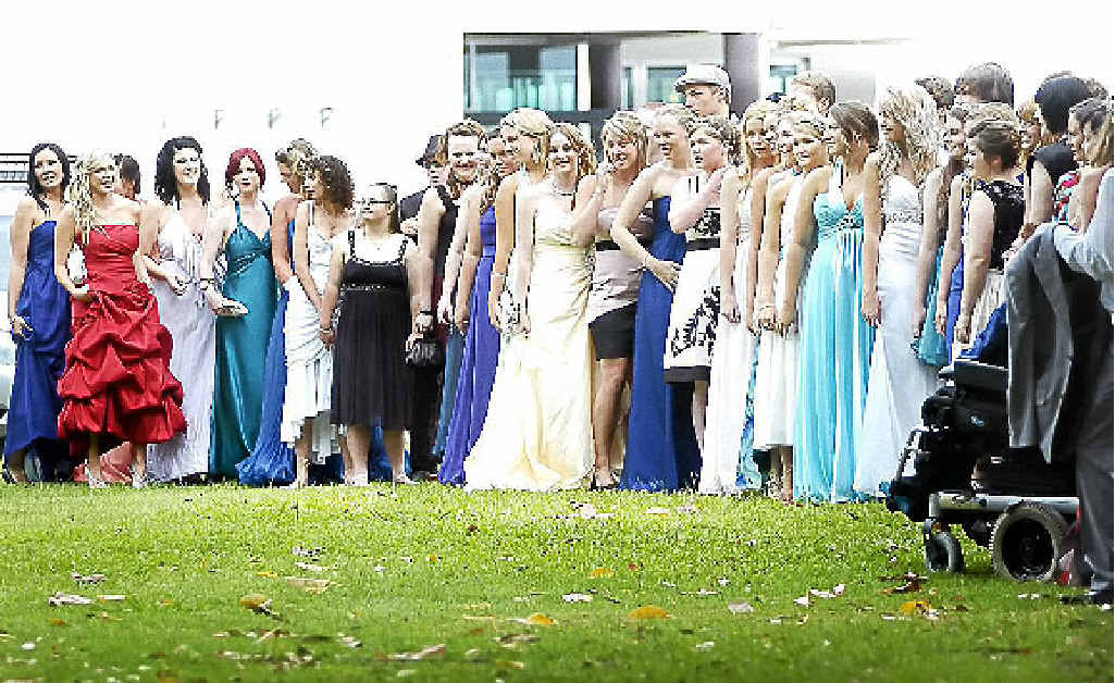 The Southern Cross School K-12 graduates line up to have their picture taken at Ballina RSL Club last year. The Southern Cross School K-12 graduates line up to have their picture taken at Ballina RSL Club last year.