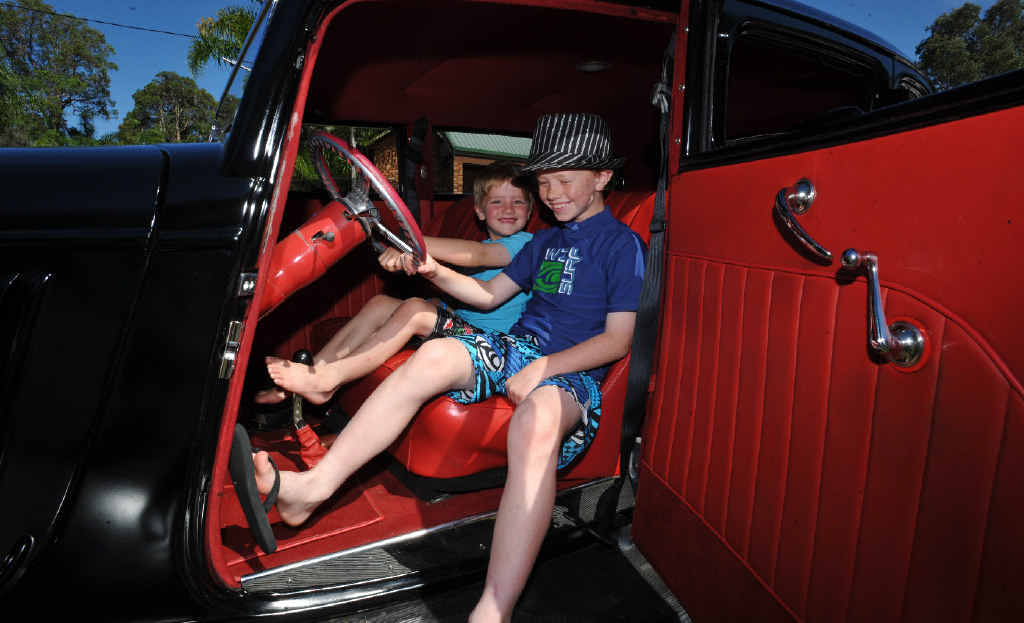 Mitchell Duddy, 6, and brother Connor, 9, in their dad’s 1934 Ford ahead of the Hot Rod Run in Yamba. Mitchell Duddy, 6, and brother Connor, 9, in their dad’s 1934 Ford ahead of the Hot Rod Run in Yamba.