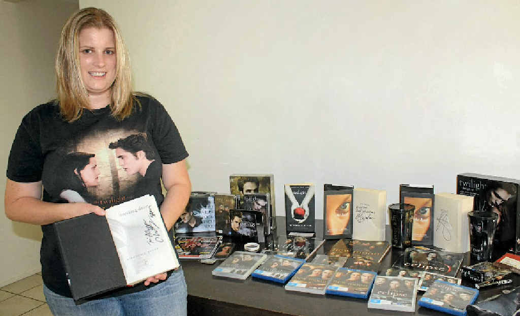 Allyson Hudson shows off all of her Twilight merchandise, as she waits excitedly for the release of the next film. Allyson Hudson shows off all of her Twilight merchandise, as she waits excitedly for the release of the next film.