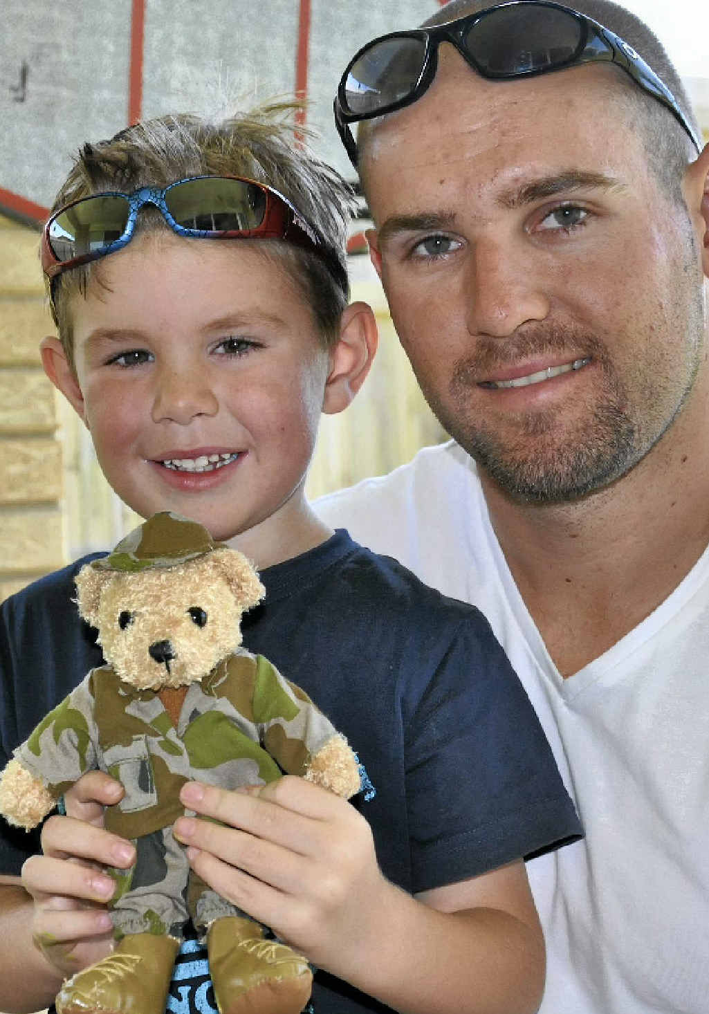 Seth McInnes and his dad, Chris, show off an army teddy bear sent as a gift from Afghanistan. Seth McInnes and his dad, Chris, show off an army teddy bear sent as a gift from Afghanistan.