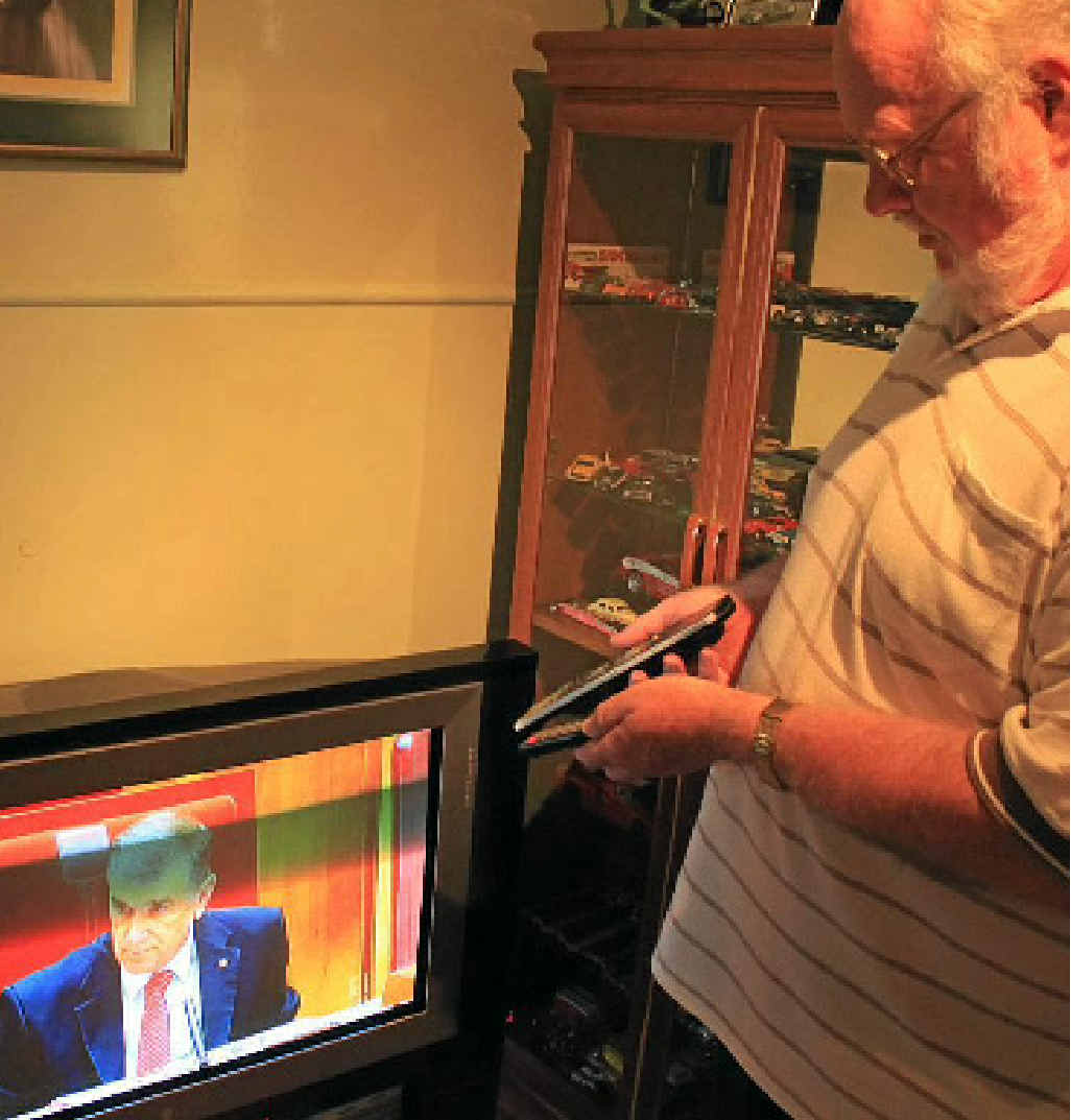 Vice President of the Warwick Senior Citizens Mr Mick Mceniery braces himself to make the switch to digital television.