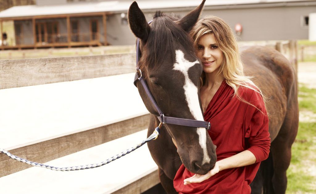 Nicoletta Romanoff with a horse in the Wolgan Valley Resort & Spa stables. Nicoletta Romanoff with a horse in the Wolgan Valley Resort & Spa stables.