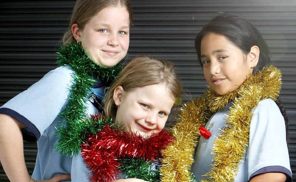 Riverview State School choir members Breanna and Maddison Galvin, with Tiare Tuaivaafau. Riverview State School choir members Breanna and Maddison Galvin, with Tiare Tuaivaafau.