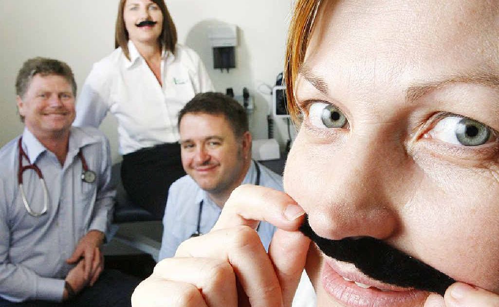 UQ Health Care practice manager Vanessa Stamp joins doctors Simon Barnett and Rob Kielty and staff member Michele Stumpf donning moustaches for men’s health. UQ Health Care practice manager Vanessa Stamp joins doctors Simon Barnett and Rob Kielty and staff member Michele Stumpf donning moustaches for men’s health.