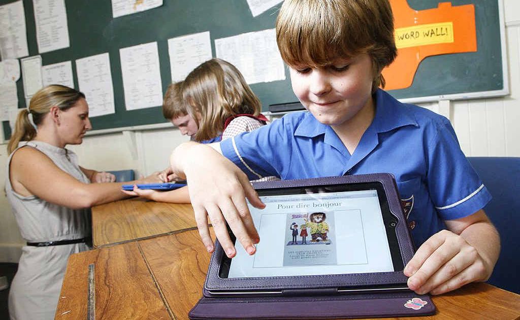 St Mary’s Primary School student Ethan Magnussen, 10, displays some of his French language class work on an iPad. St Mary’s Primary School student Ethan Magnussen, 10, displays some of his French language class work on an iPad.