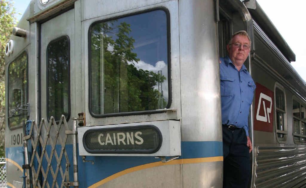 Driver Rod Andrew enjoys a break as the historic stainless steel train makes a stop in Rockhampton on its way to Cairns.