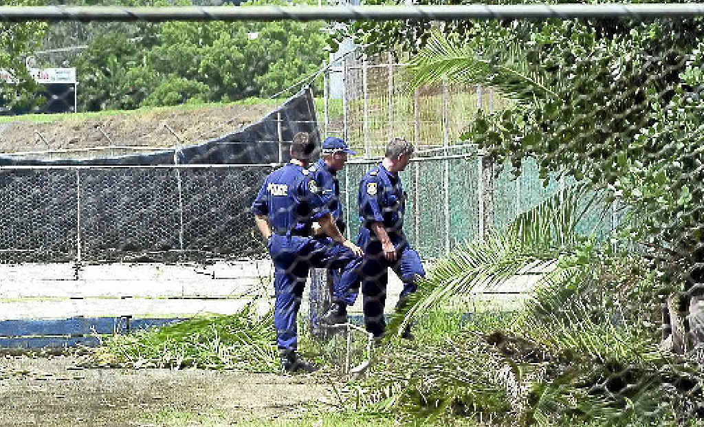 Police look for evidence in February 2007. Police look for evidence in February 2007.
