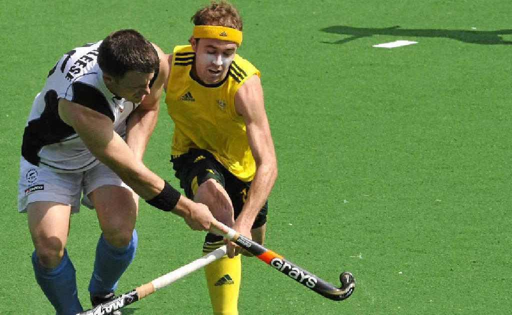 Mackay’s Matthew Swann fights for possession of the ball with New Zealand’s Shea McAleese. Swann hopes a solid effort in the upcoming Champions Trophy will edge him closer to be part of Australia’s Olympic squad in London next year. Mackay’s Matthew Swann fights for possession of the ball with New Zealand’s Shea McAleese. Swann hopes a solid effort in the upcoming Champions Trophy will edge him closer to be part of Australia’s Olympic squad in London next year.