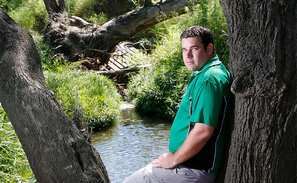 Troy Beahan of the Ipswich Knights inspects the state of the creek behind the club’s football ground. Rubbish and debris deposited in the Bundamba creek during the January floods has not be removed. Troy Beahan of the Ipswich Knights inspects the state of the creek behind the club’s football ground. Rubbish and debris deposited in the Bundamba creek during the January floods has not be removed.