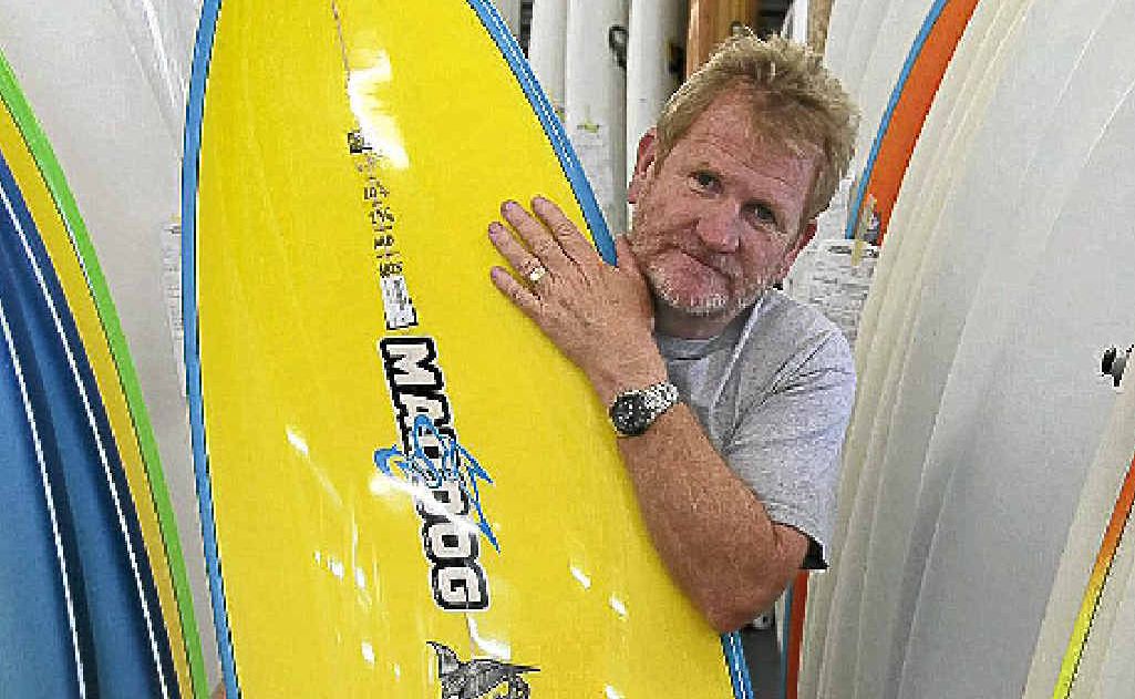 Maddog Surfboards shop owner John Morgan is concerned about the influx of cheap boards from China. Maddog Surfboards shop owner John Morgan is concerned about the influx of cheap boards from China.