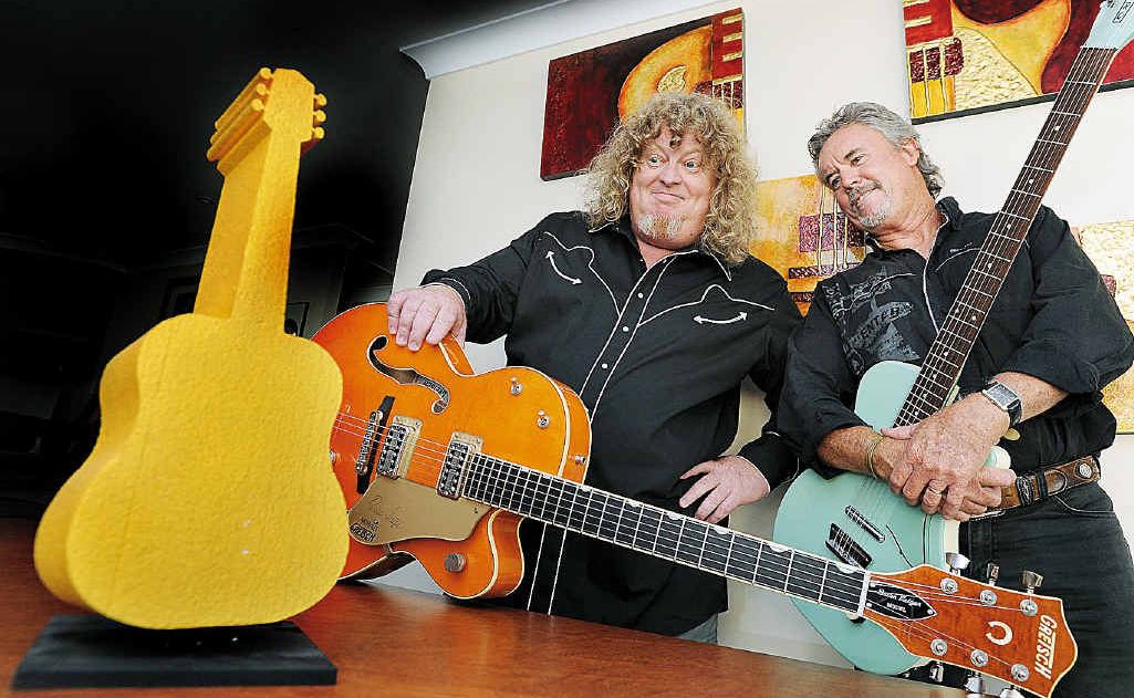 Nominated for two Golden Guitar Awards Robbie Mackay, (left), and Gary Koehler from Bobkatz, hoping to turn their clayton’s golden guitar into a real one. Nominated for two Golden Guitar Awards Robbie Mackay, (left), and Gary Koehler from Bobkatz, hoping to turn their clayton’s golden guitar into a real one.
