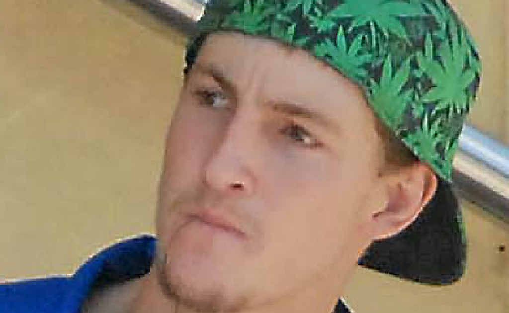 Kie Riley was wielding an axe and barking like a dog at other road-users on the Ron Camm Bridge. Kie Riley was wielding an axe and barking like a dog at other road-users on the Ron Camm Bridge.