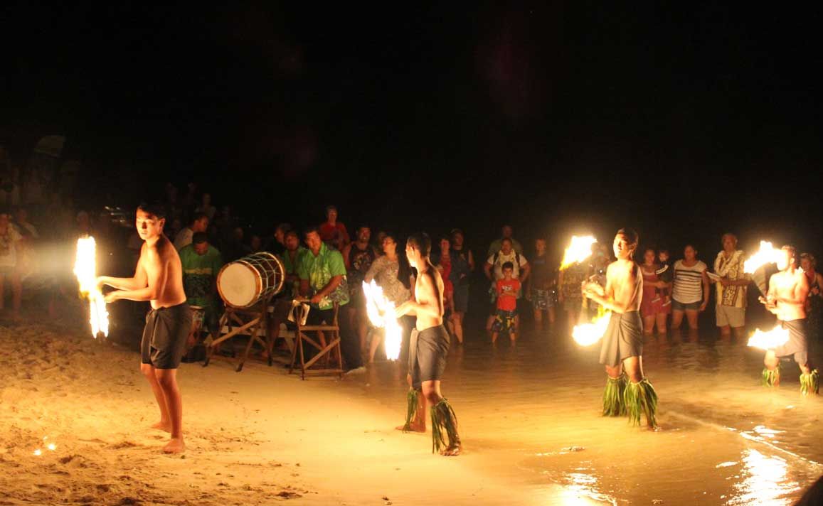 CULTURE: Whitsunday paddlers enjoyed their entire experience in the Cook Islands. Here residents from Rarotonga are showing off the art of fire twirling. Photo Contributed CULTURE: Whitsunday paddlers enjoyed their entire experience in the Cook Islands. Here residents from Rarotonga are showing off the art of fire twirling. Photo Contributed