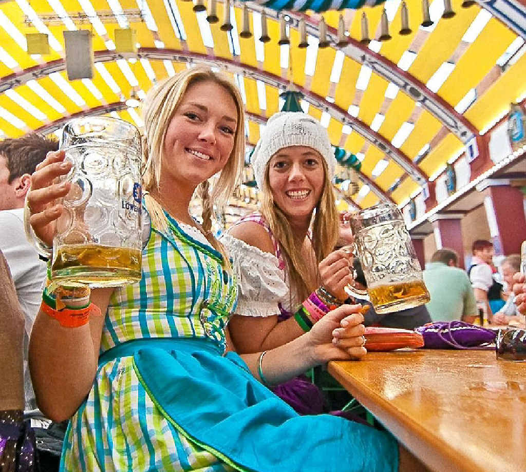 BOTTOMS UP: Beer drinkers flock to the Munich Oktoberfest. BOTTOMS UP: Beer drinkers flock to the Munich Oktoberfest.