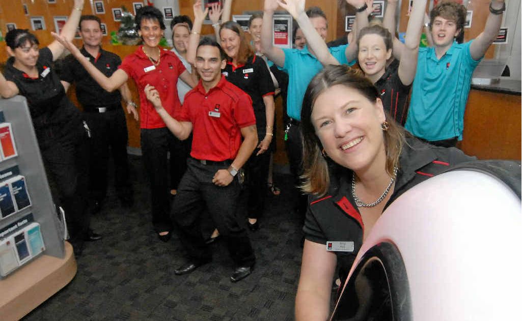 NAB customers and staff break into dance after store manager Nina Hall selects a song on the new jukebox. NAB customers and staff break into dance after store manager Nina Hall selects a song on the new jukebox.
