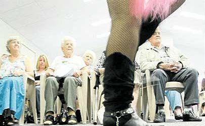 Kyogle seniors put on a burlesque bootscooting demonstration. Kyogle seniors put on a burlesque bootscooting demonstration.