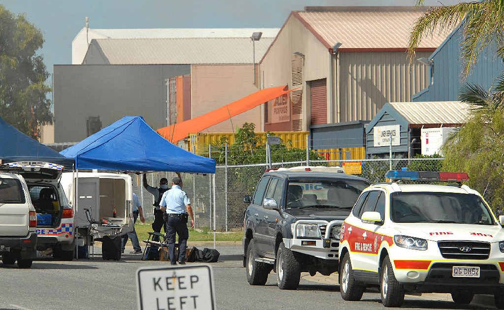 Smoke visible near the roof of Allied Pickfords in Mackay following siege. Smoke visible near the roof of Allied Pickfords in Mackay following siege.