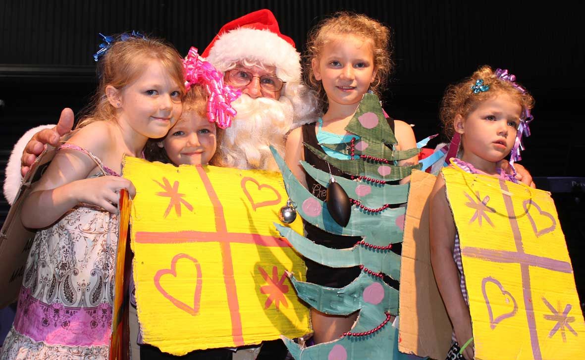 Funnel Bay kids Bonnie Car-Mitchell and Athina, Fayith and Elizabeth Mitchell dressed up and met with Santa at the Carols by the Beach night at the Whitsunday PCYC. Photo Zac Bailey / Whitsunday Times Funnel Bay kids Bonnie Car-Mitchell and Athina, Fayith and Elizabeth Mitchell dressed up and met with Santa at the Carols by the Beach night at the Whitsunday PCYC. Photo Zac Bailey / Whitsunday Times