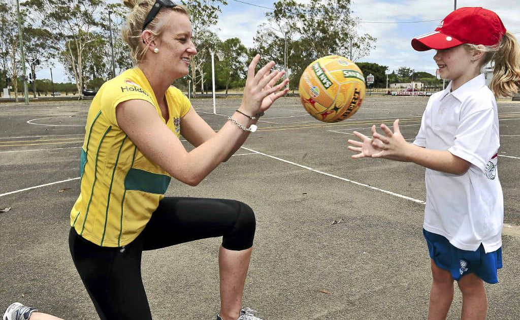 Lauren Nourse from the Australian Diamonds team gives McKenzie Ferguson a few netball tips at Daph Geddes Park. Lauren Nourse from the Australian Diamonds team gives McKenzie Ferguson a few netball tips at Daph Geddes Park.