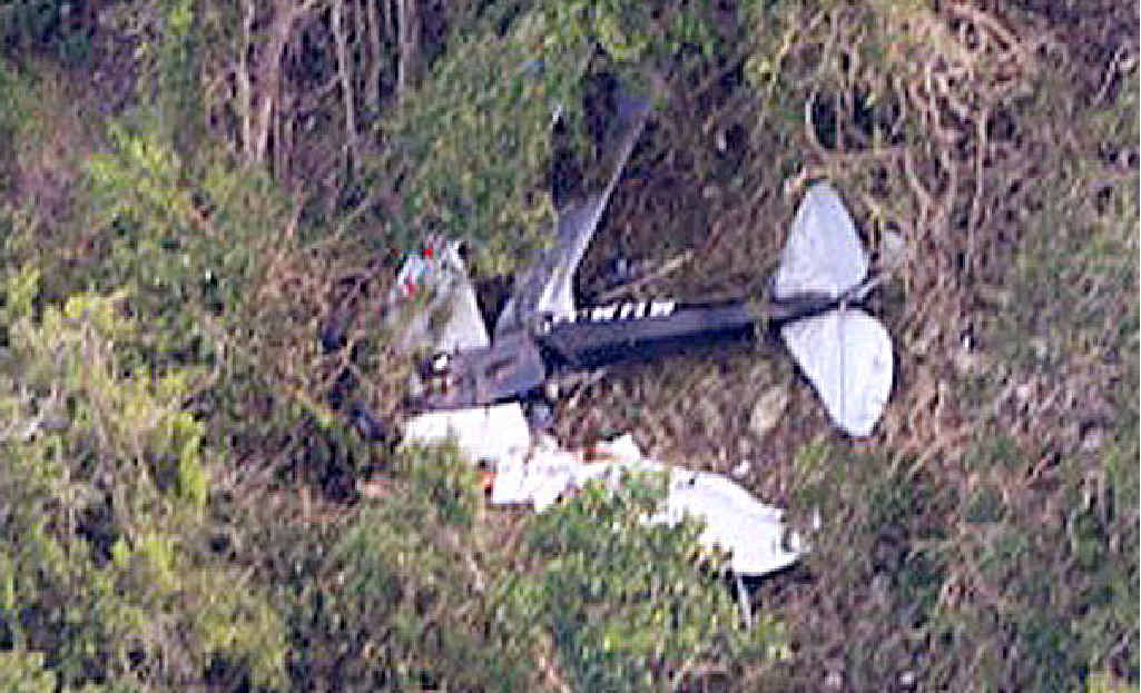 The wreckage of the Tiger Moth crash which was survived by Toowoomba pilots Warren Buckley and Ray Garner. The wreckage of the Tiger Moth crash which was survived by Toowoomba pilots Warren Buckley and Ray Garner.