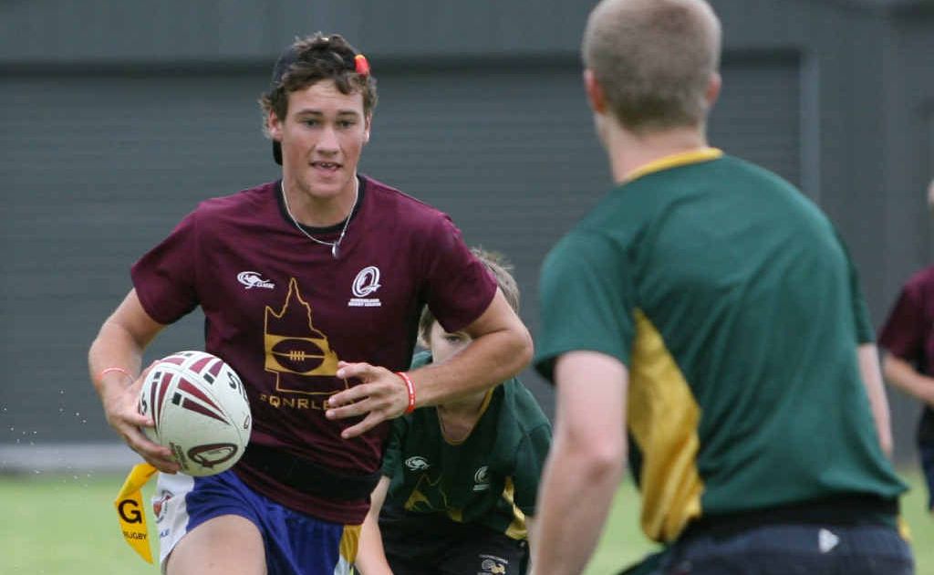 Bill Cullen speeds through the defence the QRL training camp. Bill Cullen speeds through the defence the QRL training camp.