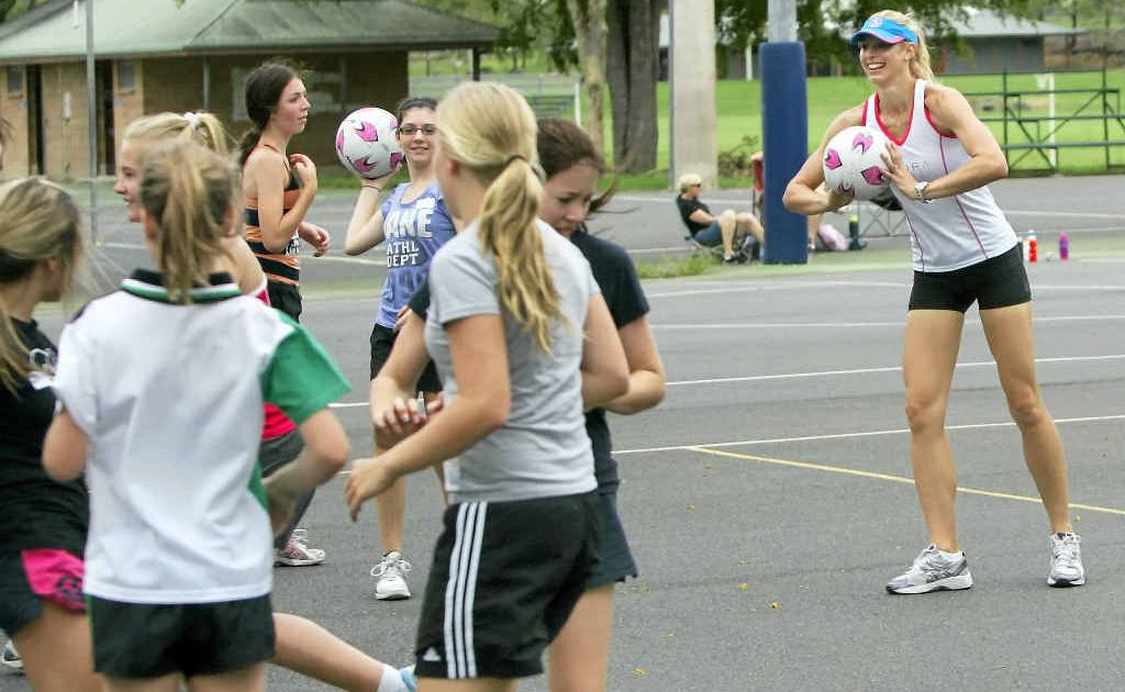Queensland Firebirds defender Laura Geitz loves coaching country kids and there were plenty at Jardine Park on Saturday. Queensland Firebirds defender Laura Geitz loves coaching country kids and there were plenty at Jardine Park on Saturday.