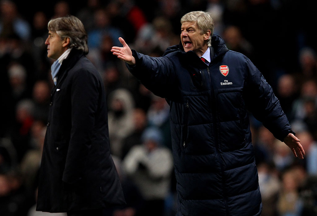 Arsene Wenger (right). Arsene Wenger (right).