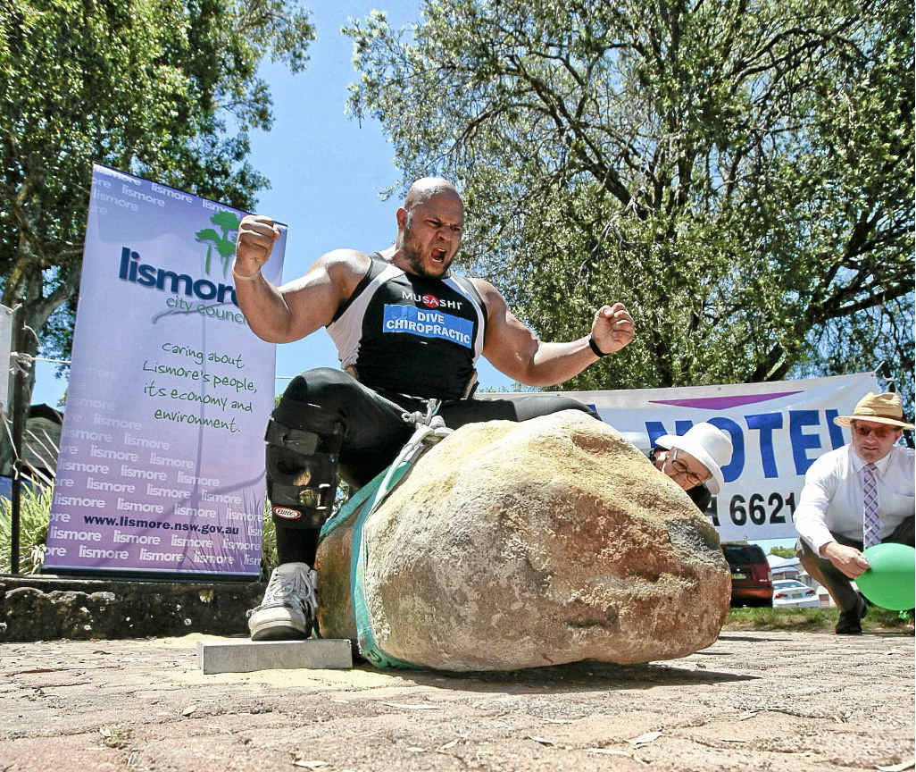 Strongman Derek Boyer lifting a 760kg rock to take the title of Australia’s Strongest Man on Australia Day in Lismore last January.