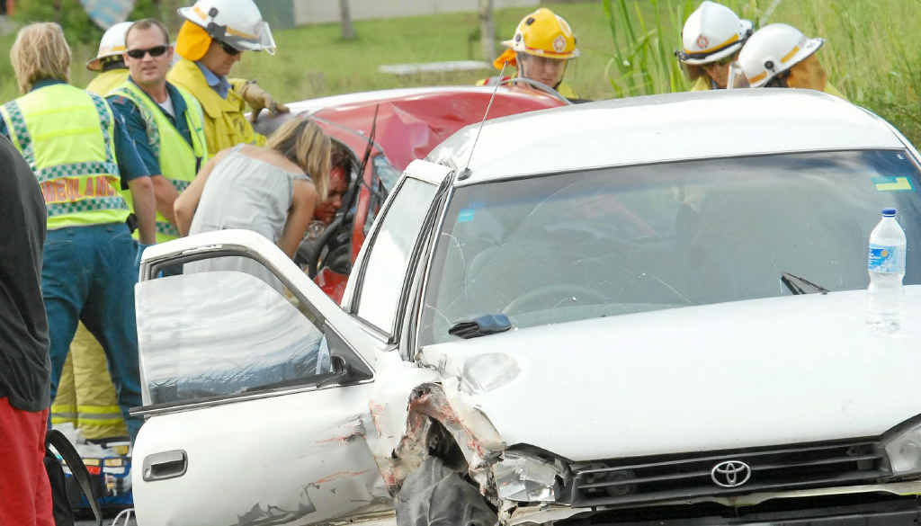 Rescuers work to free Jason Jocumsen from his car after the crash at Kuttabul. He was partially scalped and his right leg was broken in five places. Rescuers work to free Jason Jocumsen from his car after the crash at Kuttabul. He was partially scalped and his right leg was broken in five places.