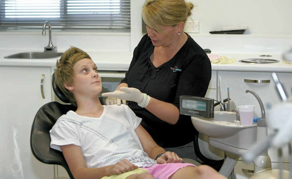 Rockhampton dentist of 14 years Dr Sharon Telford tells her son Owen Telford about the dangers of do-it-yourself teeth whiteners. Rockhampton dentist of 14 years Dr Sharon Telford tells her son Owen Telford about the dangers of do-it-yourself teeth whiteners.