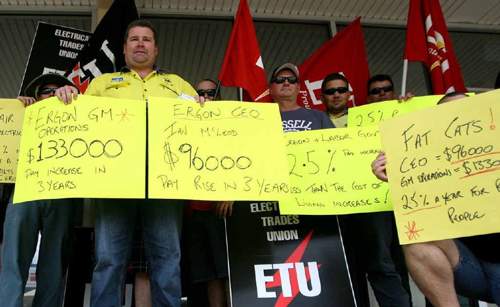 Craig Giddens, of the ETU, leads a group of protesters outside Robert Schwarten’s office. Craig Giddens, of the ETU, leads a group of protesters outside Robert Schwarten’s office.