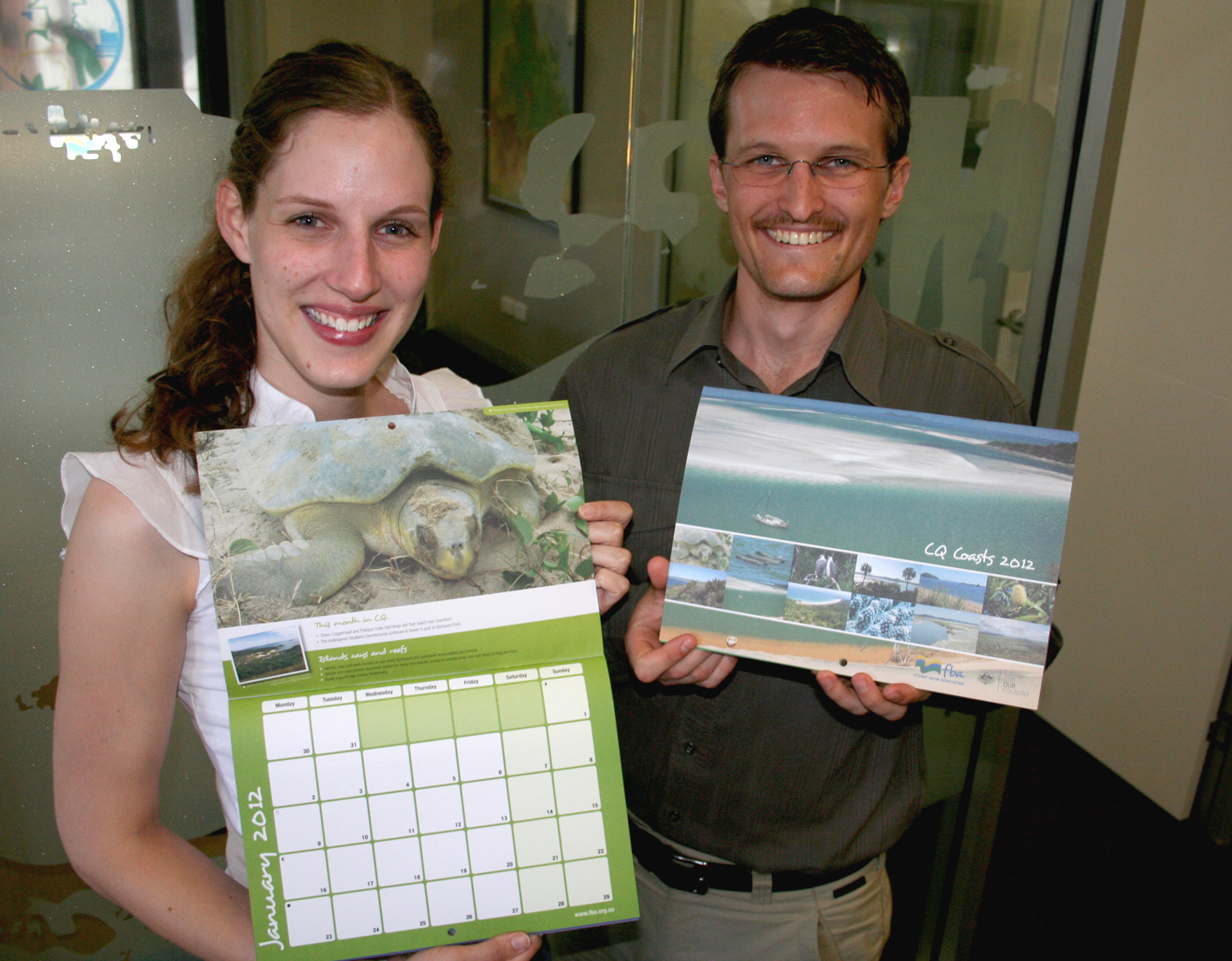 Fitzroy Basin Association Coastal team members Jenna Bishop and Shannon van Nunen with the 2012 calendars. Fitzroy Basin Association Coastal team members Jenna Bishop and Shannon van Nunen with the 2012 calendars.