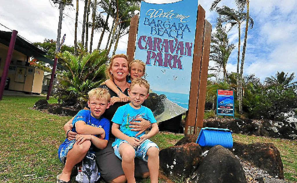 Bargara Caravan Park’s Jody and Summah Keen with visitors Ashtyn and Callum Baas. Jody is keeping up the Christmas spirit even though the park’s numbers are down. Bargara Caravan Park’s Jody and Summah Keen with visitors Ashtyn and Callum Baas. Jody is keeping up the Christmas spirit even though the park’s numbers are down.