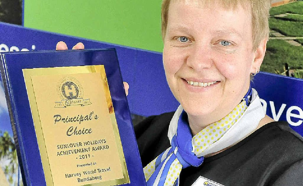 Harvey World Travel office manager Jenny Gregg with the recently won Sunlover Achievement Award. Harvey World Travel office manager Jenny Gregg with the recently won Sunlover Achievement Award.