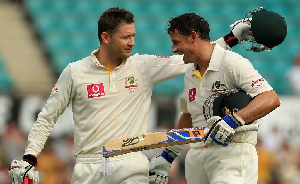 Michael Clarke of Australia hugs team mate Michael Hussey at the close of play during day two of the Second Test Match between Australia and India. Michael Clarke of Australia hugs team mate Michael Hussey at the close of play during day two of the Second Test Match between Australia and India.