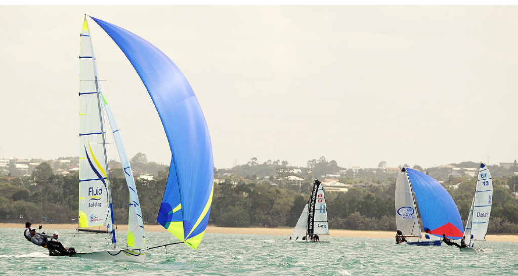 Manly Sailing Club member Clint Bowen and his two crew on Fluid Building (left) have sailed their way to winning the Australian 16ft Skiff Association Championship in Hervey Bay. Manly Sailing Club member Clint Bowen and his two crew on Fluid Building (left) have sailed their way to winning the Australian 16ft Skiff Association Championship in Hervey Bay.