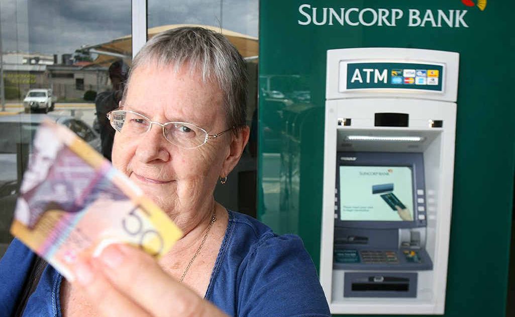 Maria Smith had a Suncorp ATM dish her a $50 note that was cut in half. Maria Smith had a Suncorp ATM dish her a $50 note that was cut in half.