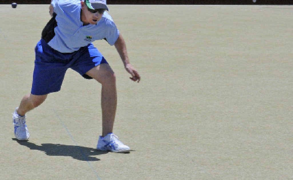 Rob Grady of Helensvale follows his bowl during sectional play in the Summerland Singles at the Ballina Bowling Club. Grady lost two tight games and was eliminated. Rob Grady of Helensvale follows his bowl during sectional play in the Summerland Singles at the Ballina Bowling Club. Grady lost two tight games and was eliminated.