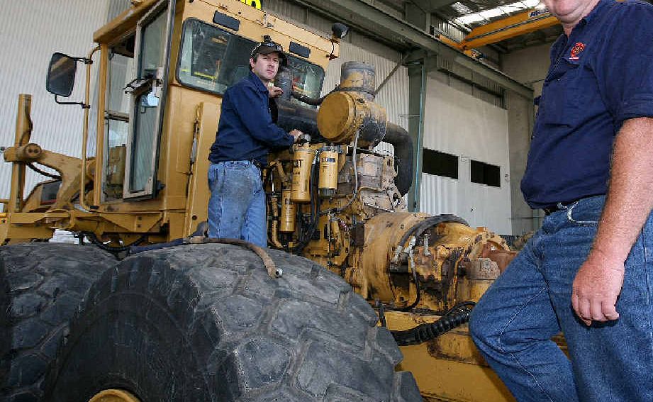 Best Tractor Parts employee Michael Murphy with workshop manager Scott Dunn will trial a new roster which has all of the benefits of a mining roster, but the workers will be able to stay home. Best Tractor Parts employee Michael Murphy with workshop manager Scott Dunn will trial a new roster which has all of the benefits of a mining roster, but the workers will be able to stay home.